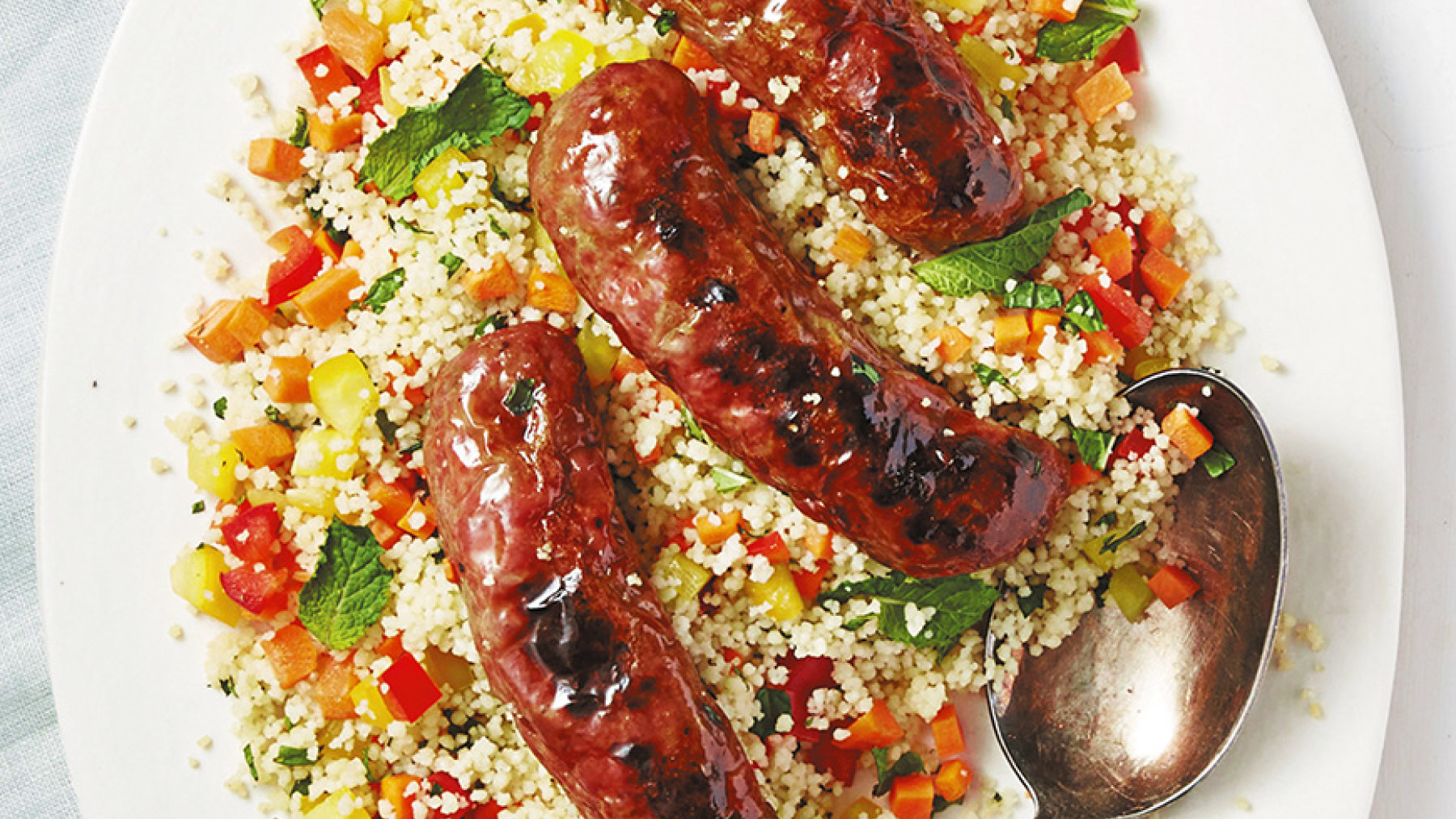 Chorizos en Cama de Cous Cous