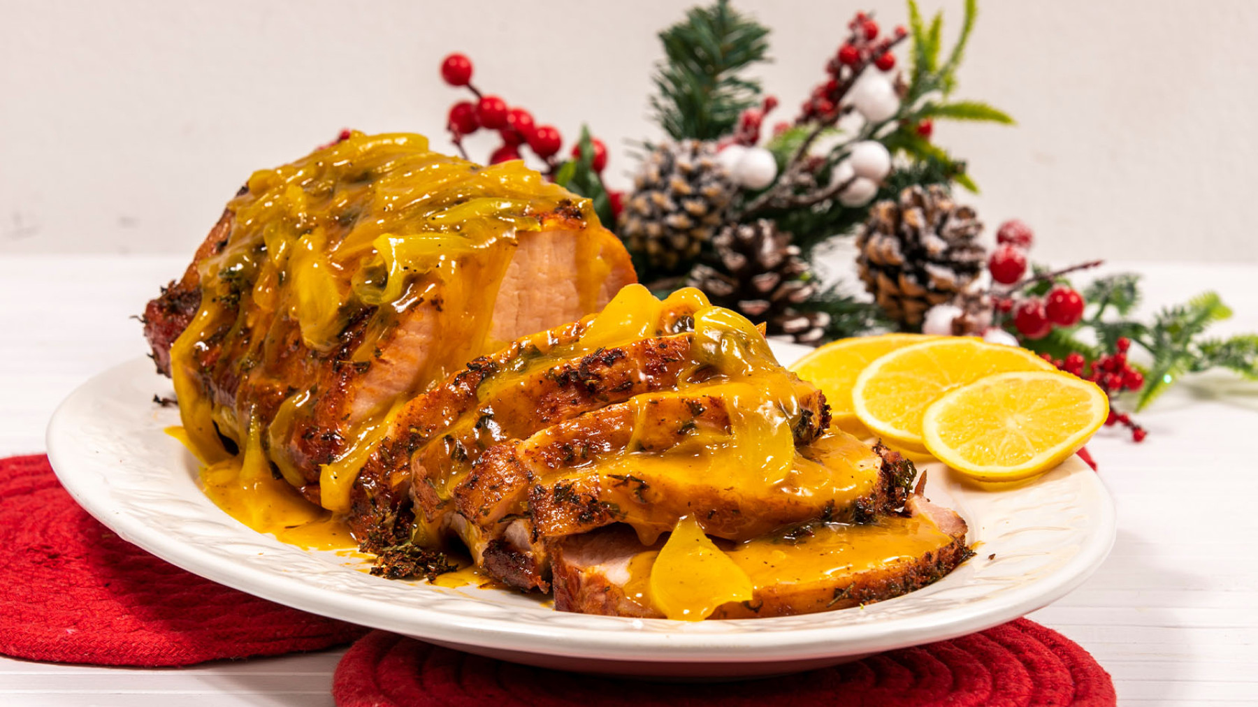 Lomito Navideño con hierbas y salsa de naranja