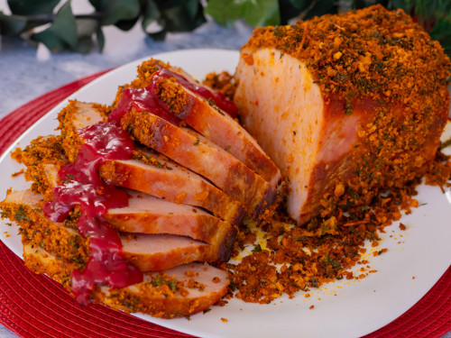 Lomito Navideño con corteza de hierbas frescas y salsa de mora
